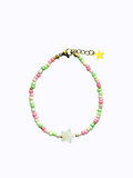 A star-shaped mother of pearl bracelet colourful (pink, green and beige) beads on a white background.