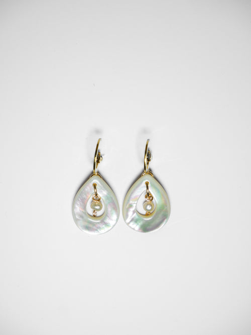 A gold earrings with teardrop-shaped mother of pearl with pearl in the middle on a white background.