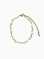 Gold Classic Pearl and Mother of Pearl Link Bracelet on a white background.
