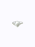 Silver wrapped ring with clover-shaped mother of pearl on the white background.