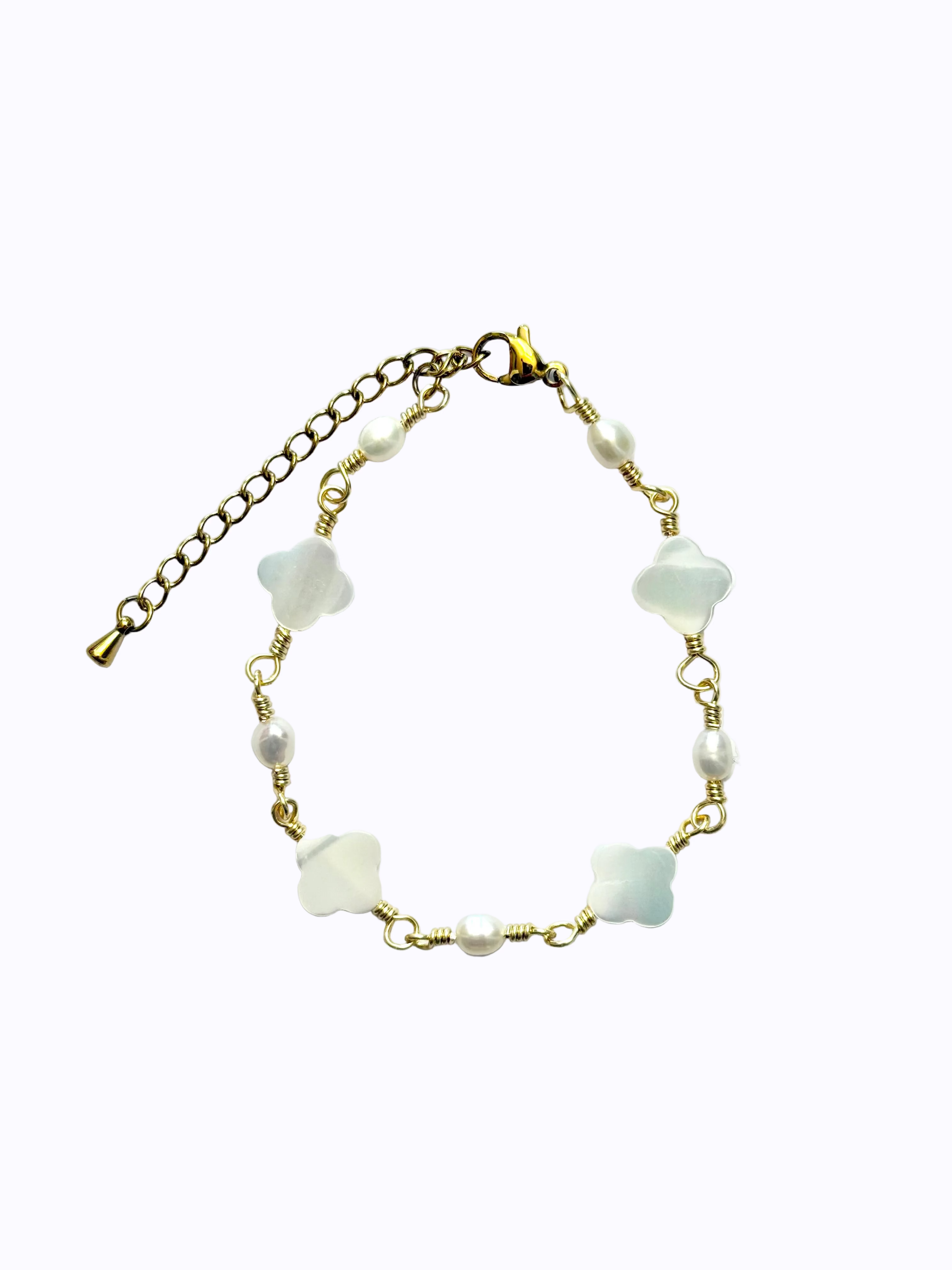 Gold Clover Pearl and Mother of Pearl Bracelet on a white background.