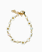 Daisy Gold Bracelet with Pearls and handmade daisy flowers designed with beads.