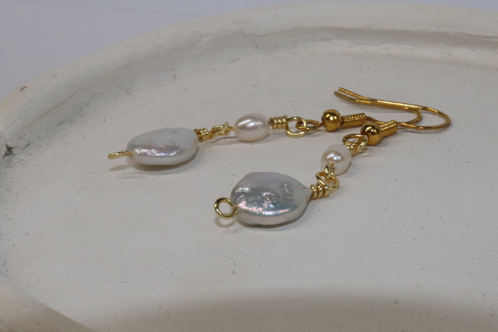 Gold Pearl Link Earrings with Pill-shape pearl as the body and round-shape pearl  at the end. Featuring hook design.