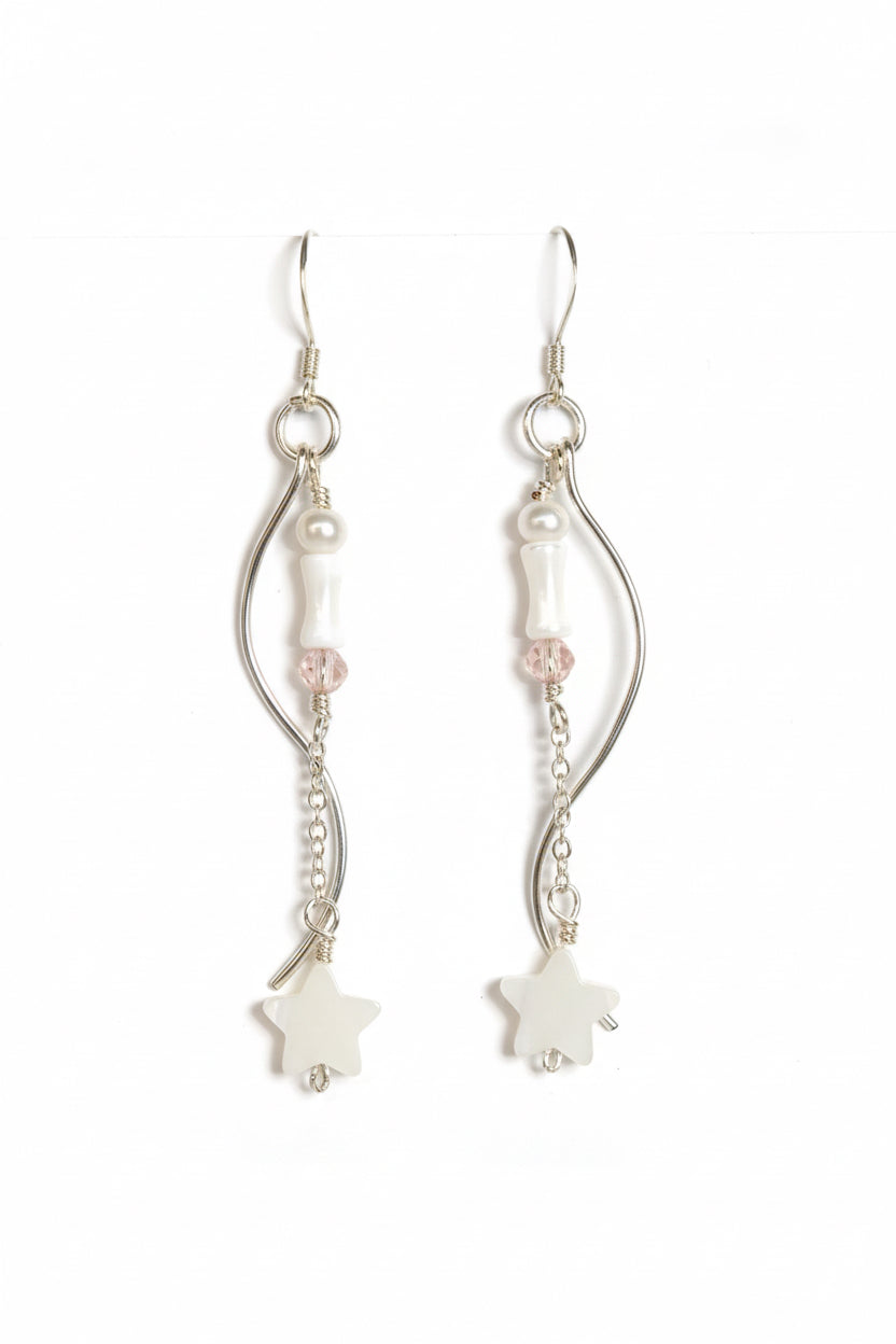 Silver-plated pair of earrings with silver-plated hooks. The body consists of a pearl, a cone-shaped mother of pearl, and a pink bead, connected by a chain and star mother of pearls at the tail. A separate curvy metal body also follow along the main body.