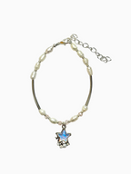 Pearl and pink beads bracelet with silver-plated body and star-shaped charm on a light grey background.